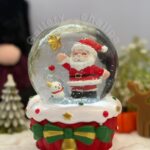 ALT=گوی کریسمسی بابانوئل و ستاره